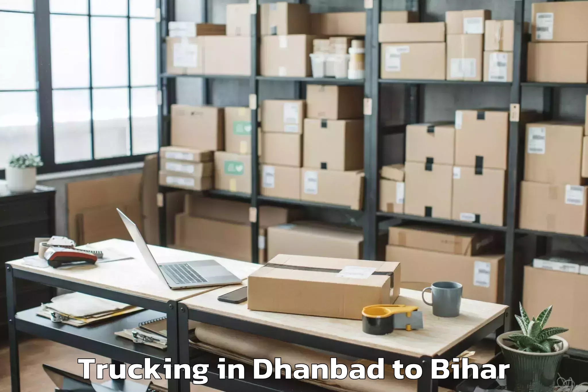 Leading Dhanbad to Makhdumpur Trucking Provider